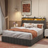 Modern bedroom with grey upholstered bed, light bedding, brown throw, and accent pillows.
