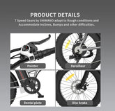 Close-up bike details showing gear shifter, derailleur, pedal crank, and disc brake.