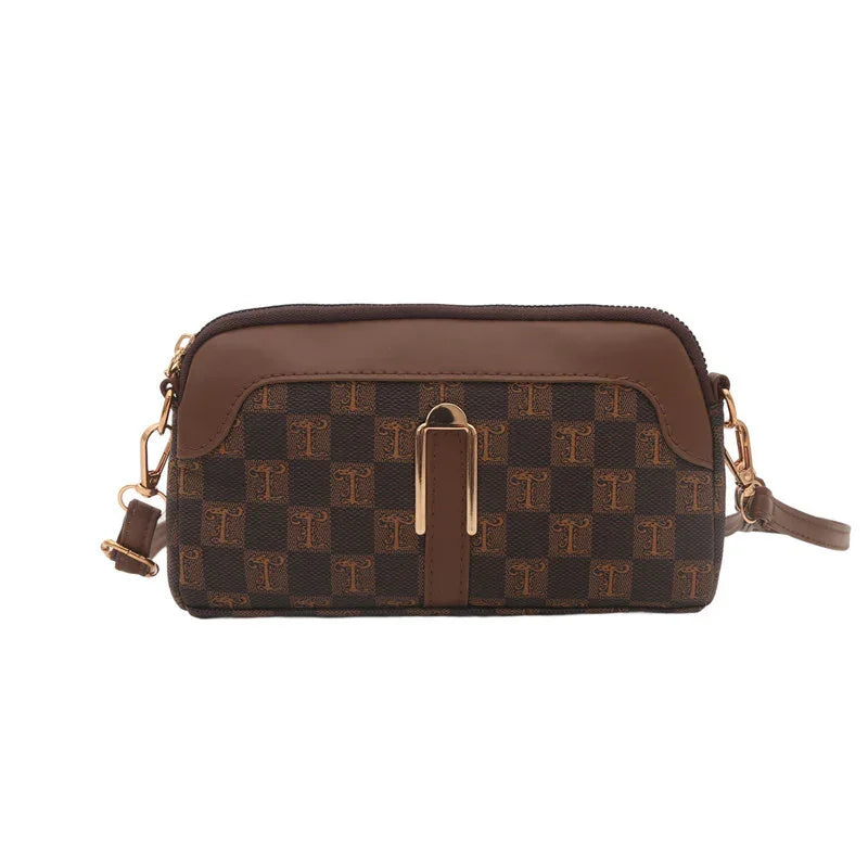 Brown checkered crossbody bag with gold hardware and adjustable strap, faux leather material