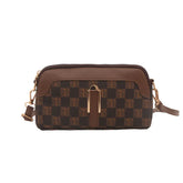 Brown checkered crossbody bag with gold hardware and adjustable strap, faux leather material