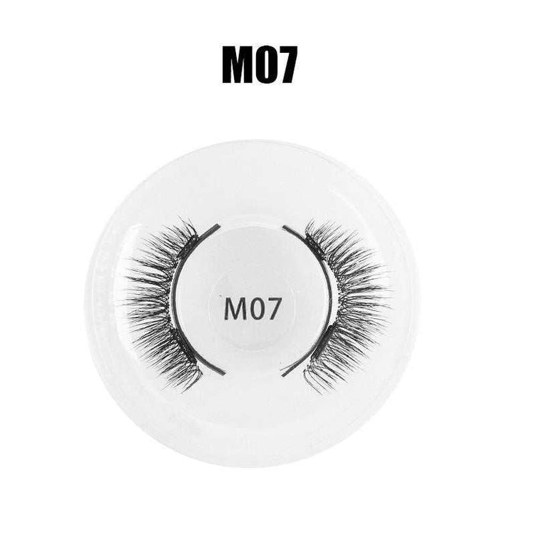 Black synthetic false eyelashes M07 style in a round clear plastic case.