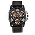 Black leather watch with red stitching, gold skeleton dial, and visible gear details
