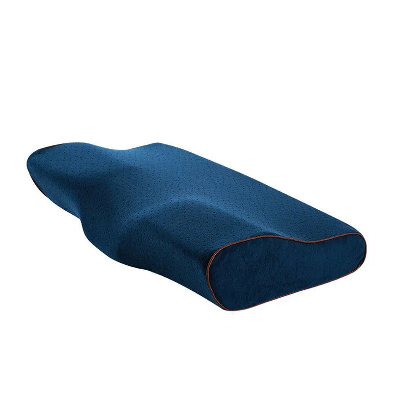Ergonomic blue memory foam pillow with contoured shape and breathable fabric cover