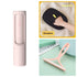 Futuristic lint remover, black fabric cleaning glove, and peach-colored cleaning scraper for clothing care