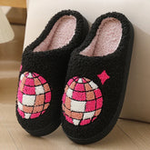 Black fuzzy slippers with pink, orange, and white chenille disco ball embroidery, cozy fit