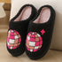 Black fuzzy slippers with pink, orange, and white chenille disco ball embroidery, cozy fit