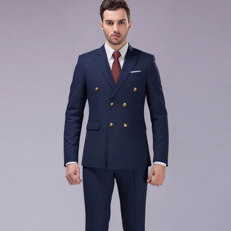 Man wearing navy blue double-breasted suit, gold buttons, slim fit, formal attire