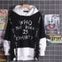Black and white oversized graphic hoodie with bold streetwear lettering, drawstrings, layered look.
