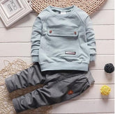 Light blue long sleeve sweatshirt with front pocket and gray jogger pants set, casual fit, soft fabric