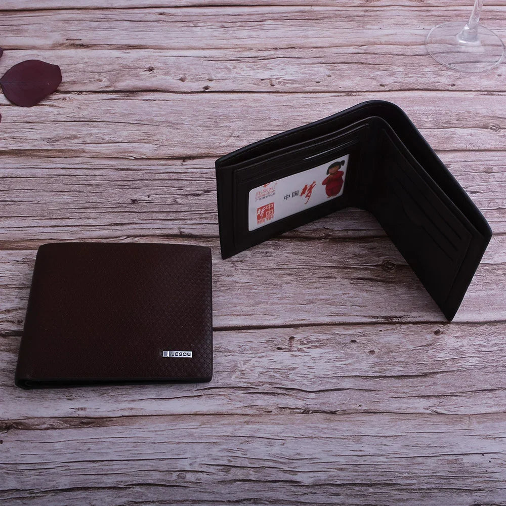 Dark brown textured leather bifold wallet with card slots on rustic wooden surface