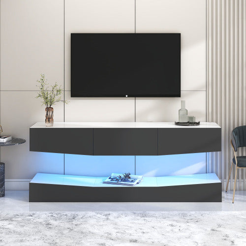 Grey particleboard hanging TV stand with LED lighting below and floating design beneath a wall-mounted TV.