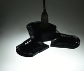 Black adjustable LED ceiling light with three panels, modern industrial style
