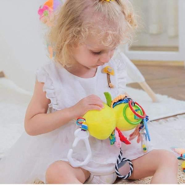 Toddler in white ruffle dress, soft cotton material, loose fit, playing indoors