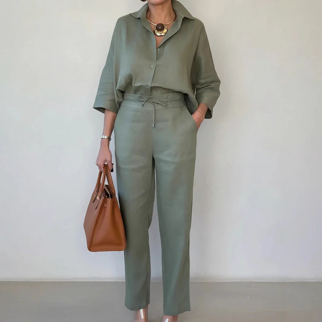 Woman wearing relaxed fit sage green linen shirt and matching high-waisted pants