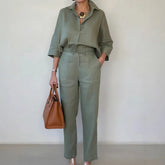 Woman wearing relaxed fit sage green linen shirt and matching high-waisted pants