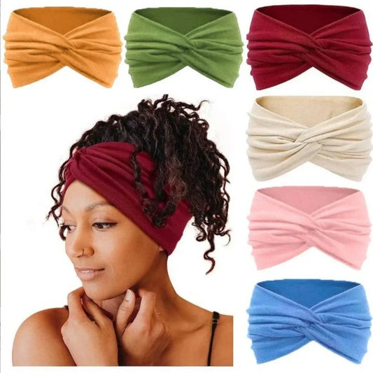Woman wearing burgundy twisted fleece headband, with six color options shown, soft stretch fit.