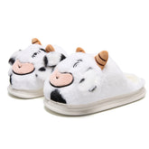 White plush cow slippers with black spots, cartoon face, round toe, cozy indoor footwear