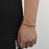 18K pure gold bracelet on wrist, simple and stylish unisex jewelry accessory