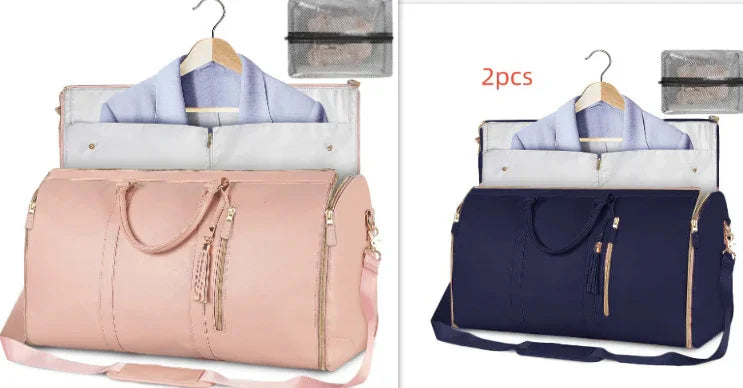 Set of two travel duffel bags in pink and navy, with matching garment and accessory bag, stylish and spacious design for packing clothes.