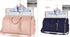 Set of two travel duffel bags in pink and navy, with matching garment and accessory bag, stylish and spacious design for packing clothes.