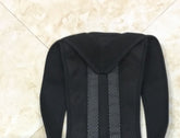 Black breathable spine bending posture corrector with adjustable straps and mesh fabric