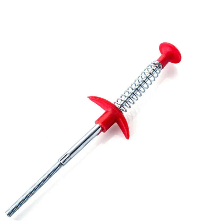 Metal and plastic spring grabber tool with red handle and push button on white background.