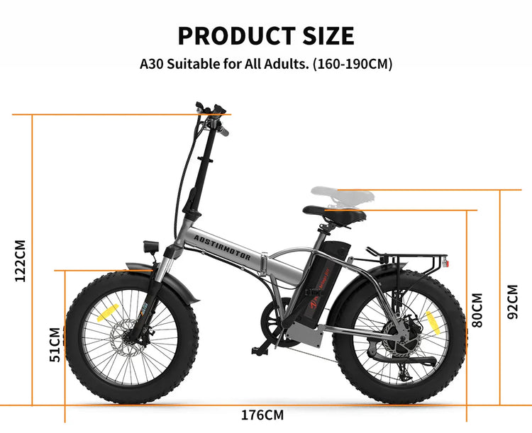 Silver electric fat tire bike with black accents, measured for adult sizing, outdoors.