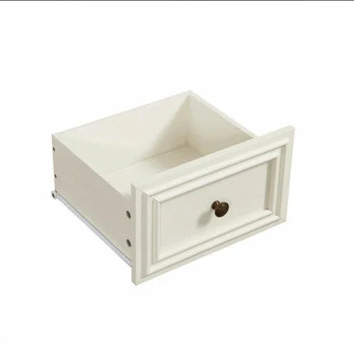 White wooden drawer with decorative panel and round metal handle