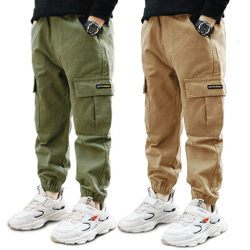 Kids cargo jogger pants in olive green and khaki, cotton fabric, relaxed fit, elastic cuffs
