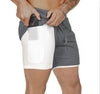 Gray and white tech shorts with side zipper, stretch fit, layered design for active wear