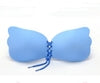 Light blue strapless bra with lace-up front, soft fabric, and scalloped edges for seamless fit