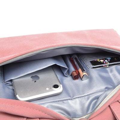 Pink PU leather women laptop bag with compartments storing smartphone and cosmetics, suitable for MacBook and notebooks.