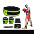 Man wearing black tank top and orange athletic shorts, using neon green resistance training gear set.