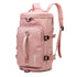 Pink waterproof backpack with adjustable straps, large front pocket, and modern streetwear style