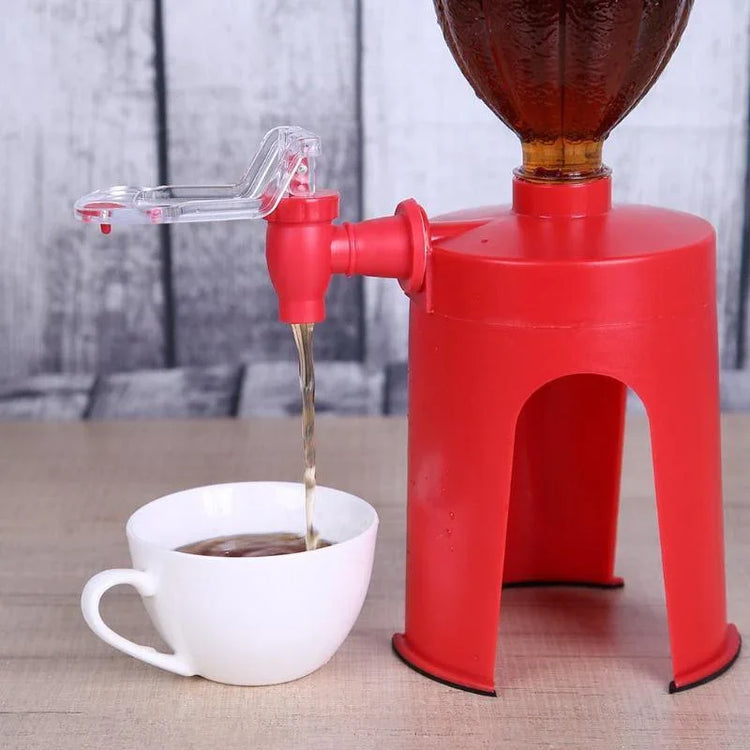 Red plastic beverage dispenser stand pouring drink into white cup on wooden surface