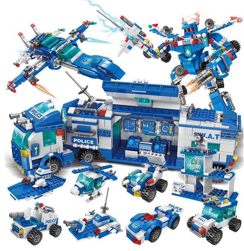 Block toy set with blue and white police vehicles, helicopter, robot, and command truck