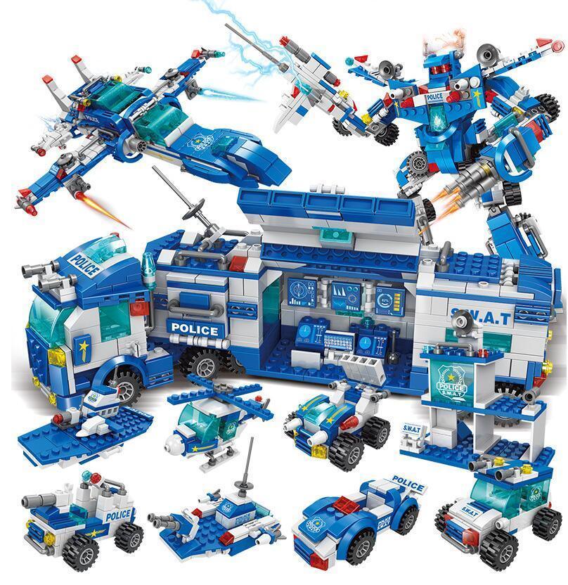 Block toy set with blue and white police vehicles, helicopter, robot, and command truck