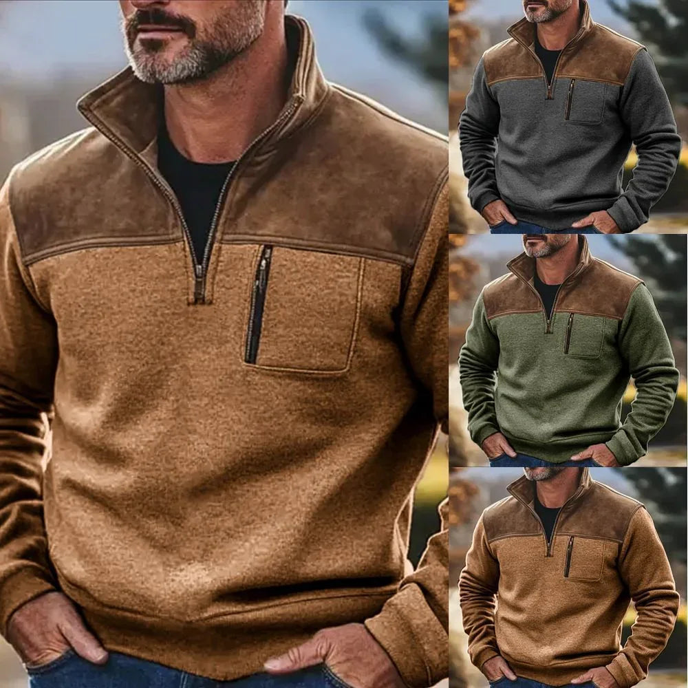 Men's fleece pullover with suede shoulder panel, zip pocket, available in brown, grey, and green.