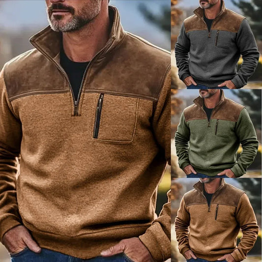 Men's fleece pullover with suede shoulder panel, zip pocket, available in brown, grey, and green.