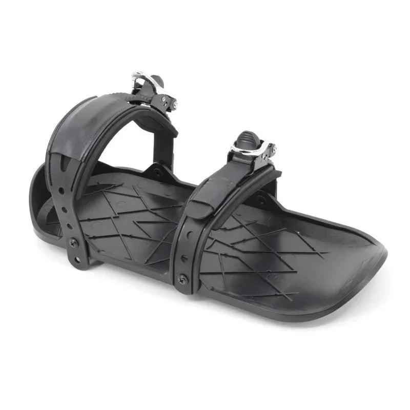 Black plastic shoe attachment with adjustable straps and textured sole, tech accessory