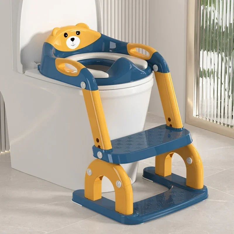 Blue and yellow bear-shaped toddler toilet training seat with sturdy steps and handles