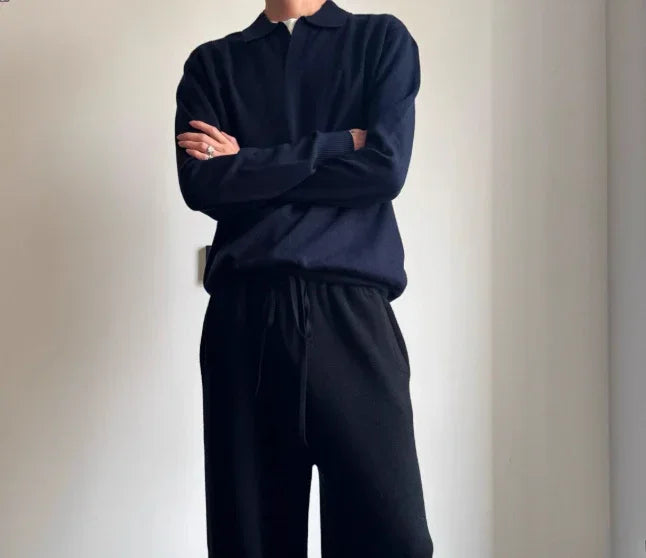 Minimalist black knit sweater and relaxed fit drawstring pants streetwear