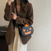Woman in a brown blazer with a black and orange pumpkin-shaped crossbody bag, casual streetwear.