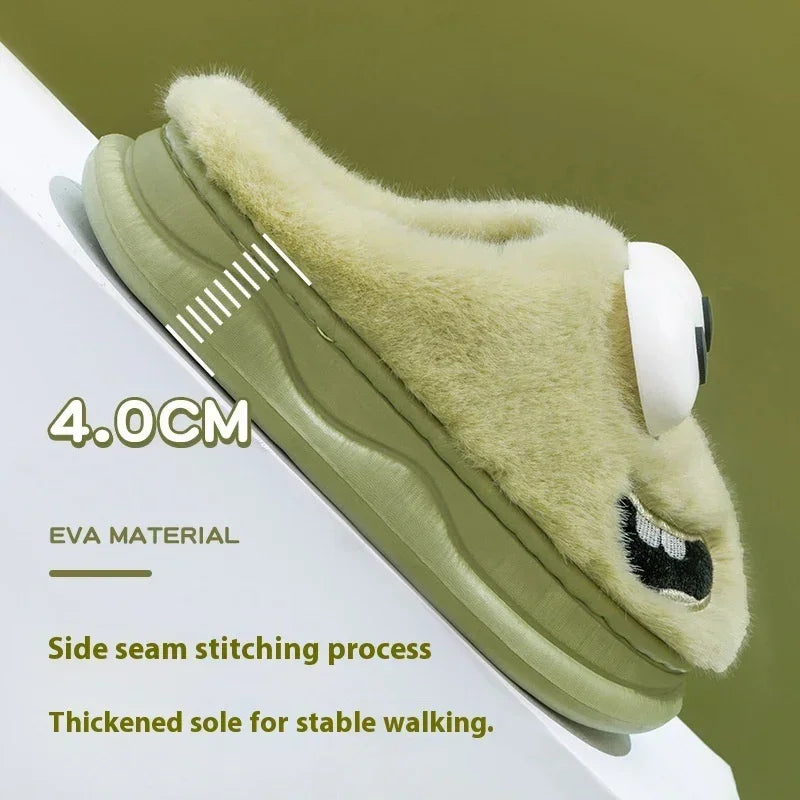 Fuzzy beige slipper with thick olive green EVA sole, cartoon embroidery, and stable fit.