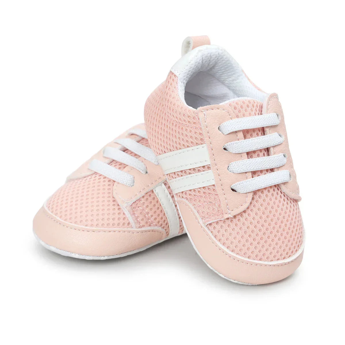 Light pink mesh sneakers with white laces and faux leather trim, sporty style, breathable fit