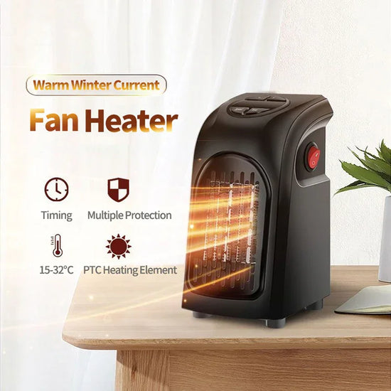 Compact black fan heater with digital controls and PTC heating element on a wooden table