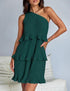 Woman wearing green one-shoulder pleated ruffle mini dress with relaxed fit