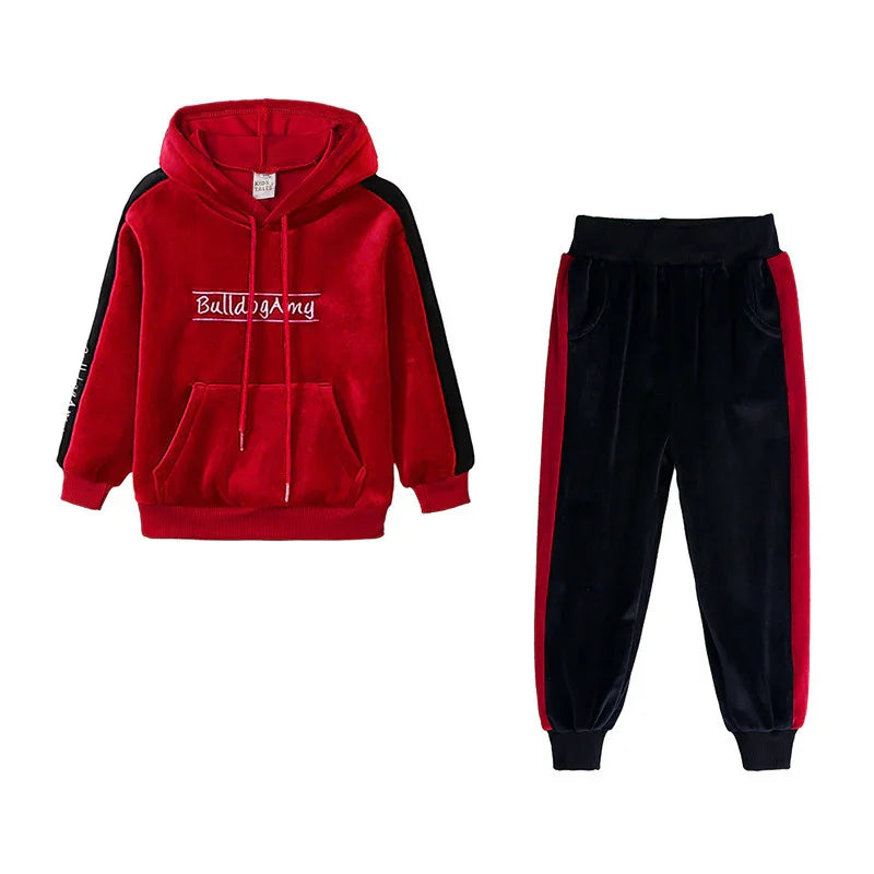 Red and black velour hoodie and jogger set with front pockets and embroidered text, relaxed fit
