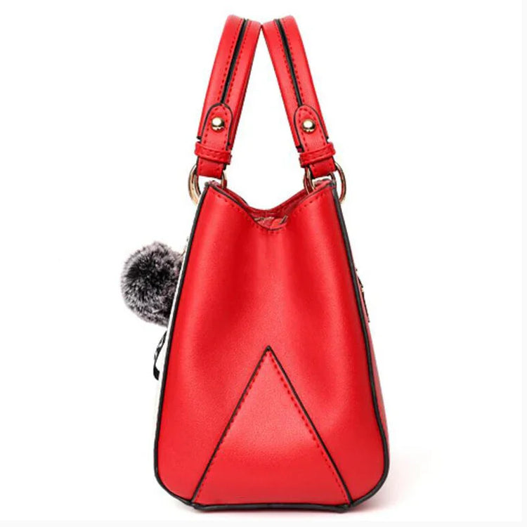 Red faux leather handbag with double handles and geometric stitching, side view