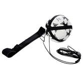 Black and white soccer ball with attached elastic training strap and adjustable belt
